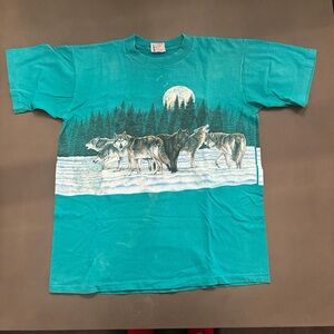 Green 80s vintage wolf winter graphic short sleeve tee shirt.